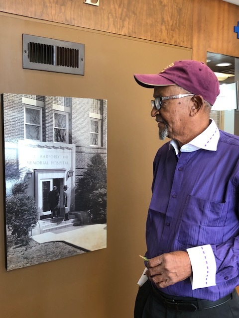 Willie Stamps and the historic entrance to Harford Memorial Hospital 